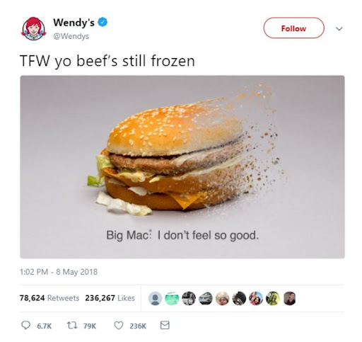 Wendy’s competitor conquesting tweet with an image of a BigMac turning to dust and blowing away, with the text “TFW yo beef’s still frozen”.