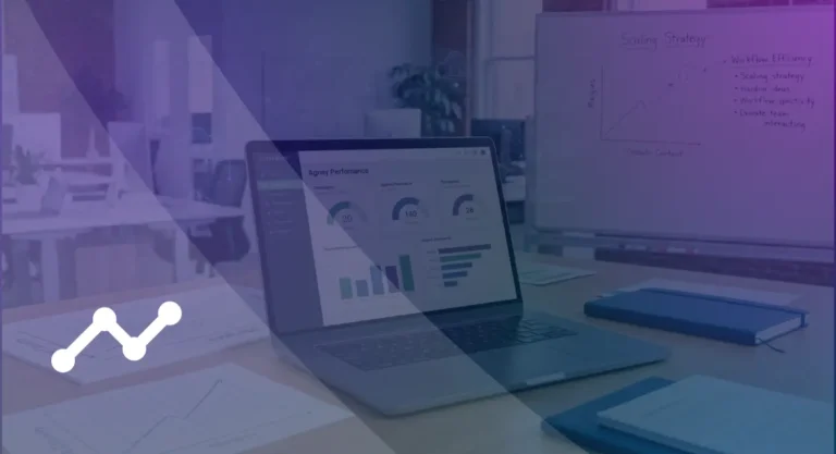 Agency performance dashboard on a laptop beside a scaling strategy whiteboard in a marketing office.