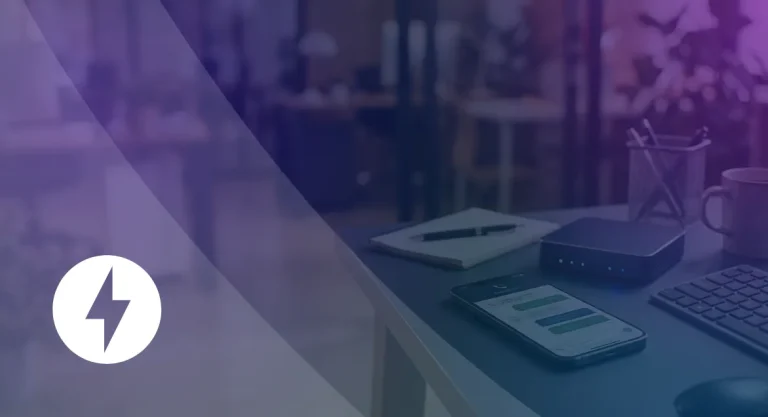 How Missed Call Text Back Works and Why Local Businesses Use It Smartphone showing a missed call text back conversation on a desk beside a business internet router, notebook, and keyboard