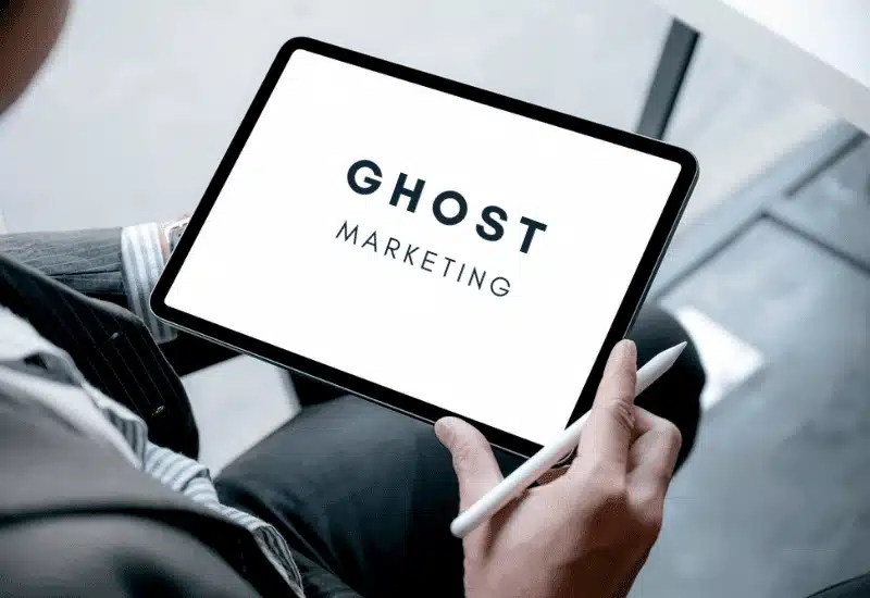 Tablet displaying Ghost Marketing logo