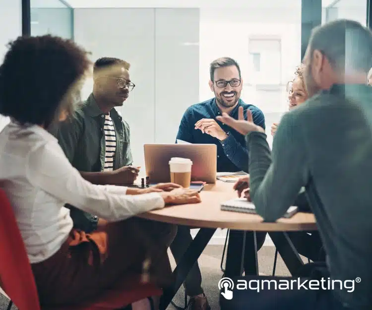 Group of coworkers discussing marketing strategy in an agency office