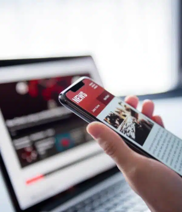 mobile phone showing news article