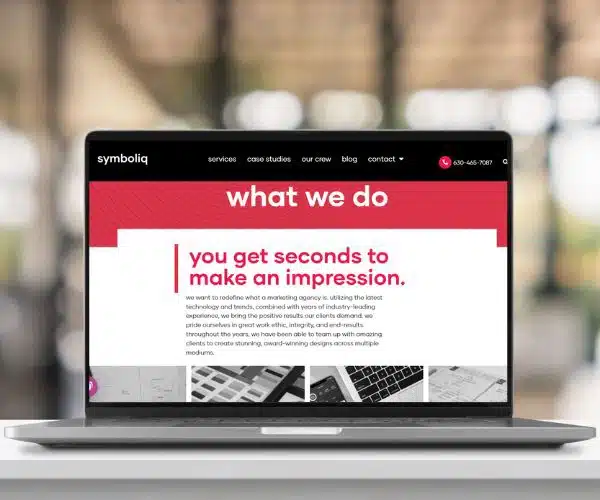 Laptop displaying Symboliq website