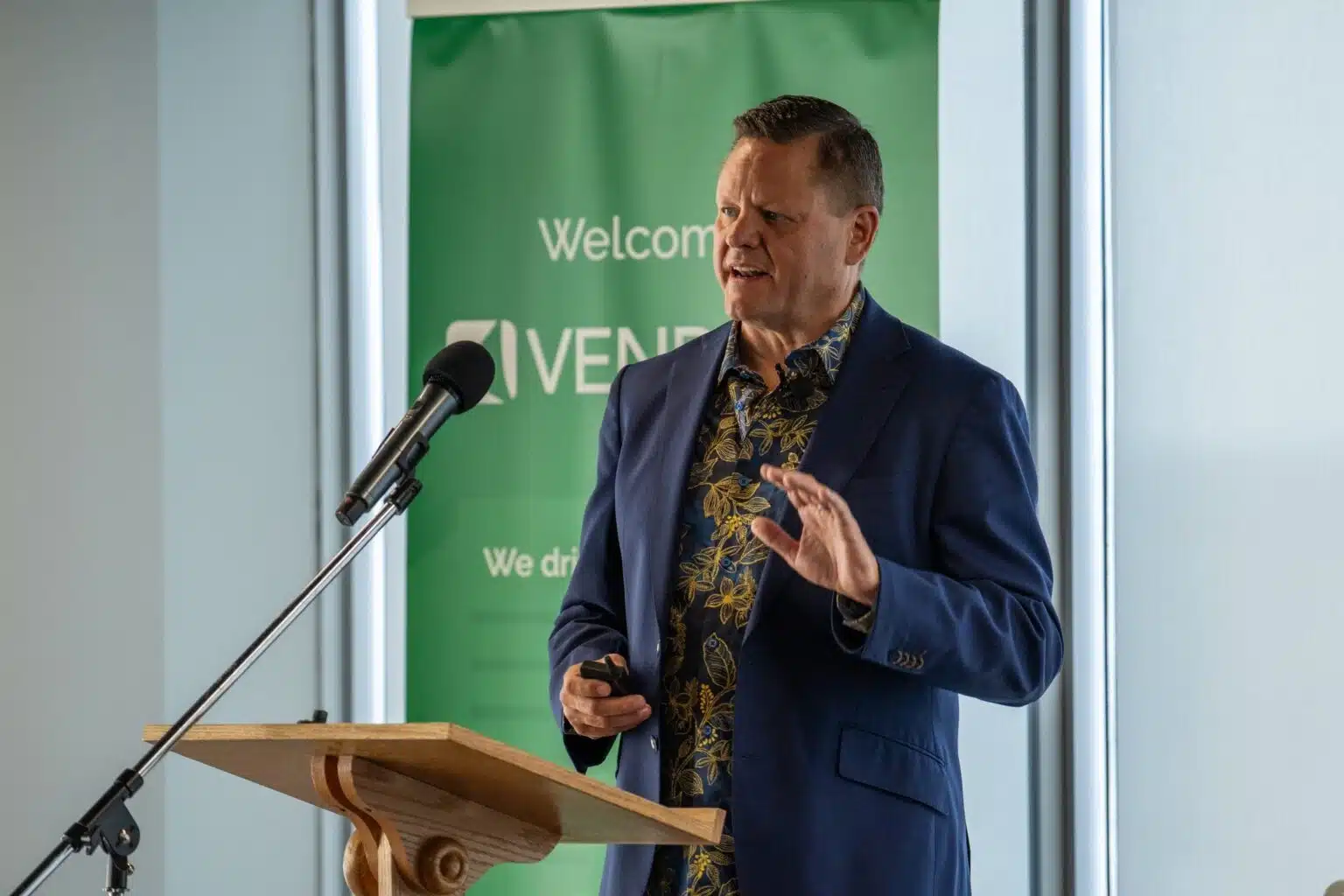 brendan king speaking at a podium