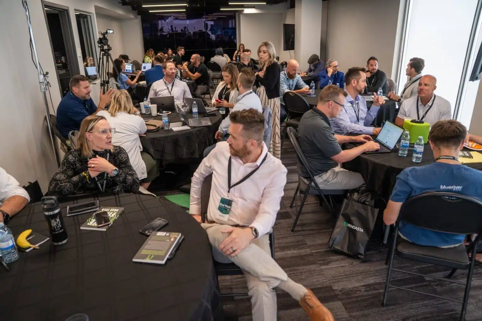 partner advisory council sitting at tables
