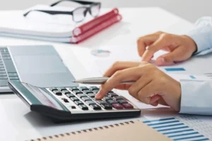 person using a calculator