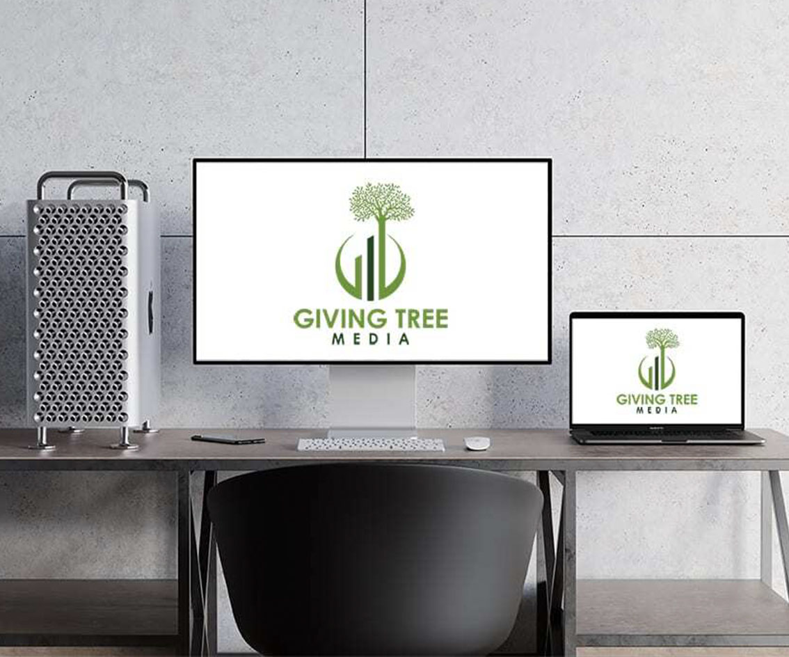 Computer with Giving Tree Media Logo