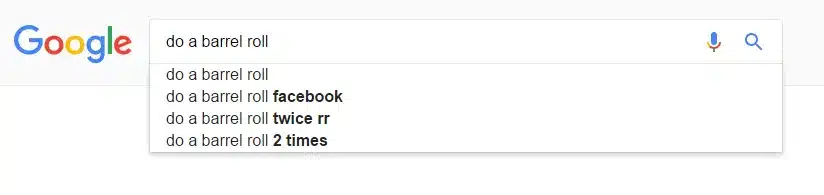 Screenshot of “do a barrel roll” typed into the Google Search field, showing how to access this Google trick and hack.