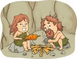 A caveman and cavewoman starting a fire.